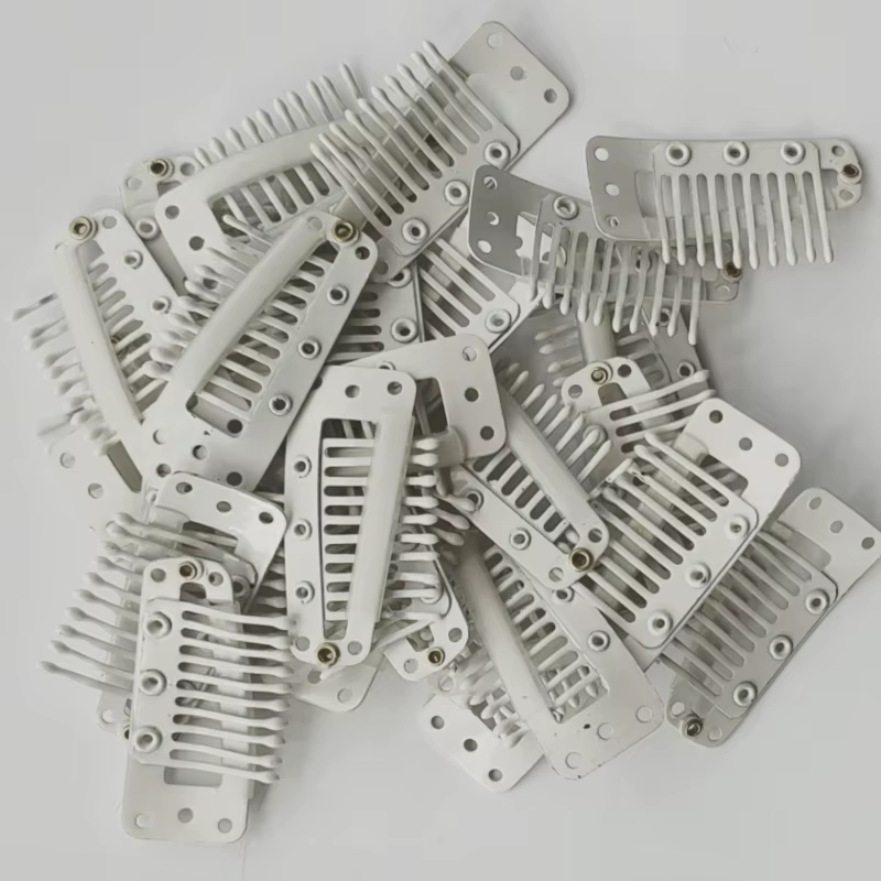 Clips à clipser pour extensions de cheveux humains