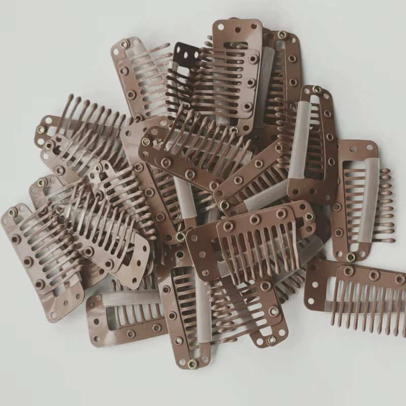 Clips à clipser pour extensions de cheveux humains