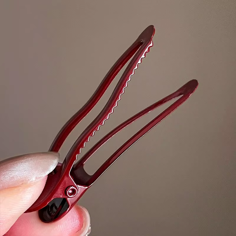 2 pinces à cheveux bordeaux