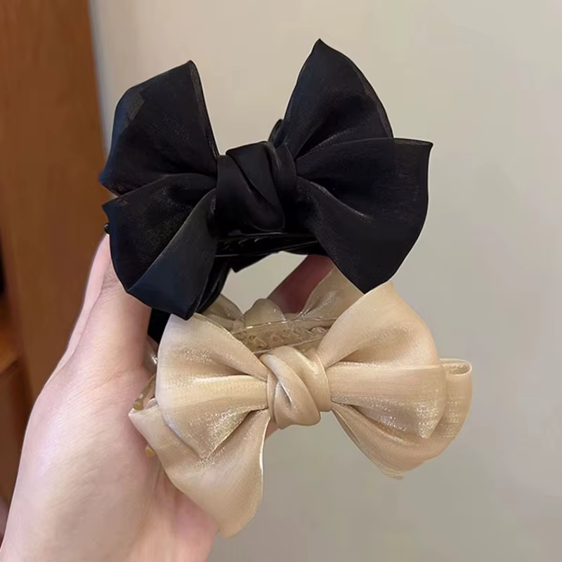 Pince à cheveux élégante pour chignon avec nœud papillon