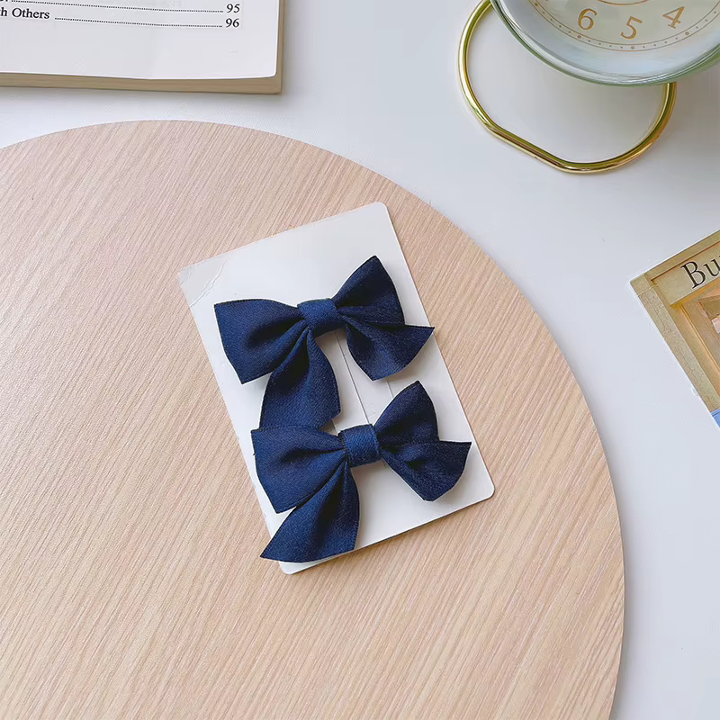 Barrettes à nœud bleu, 2 pièces
