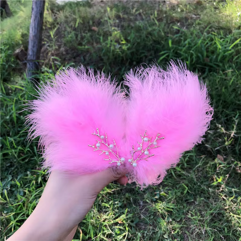 Pince à cheveux pour coiffure en plumes
