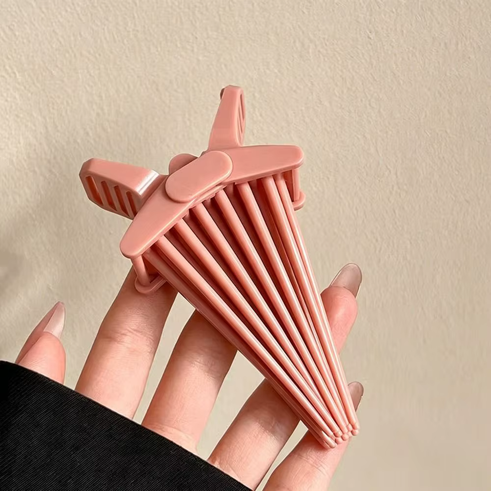 Pince à cheveux durable pour boucler les racines