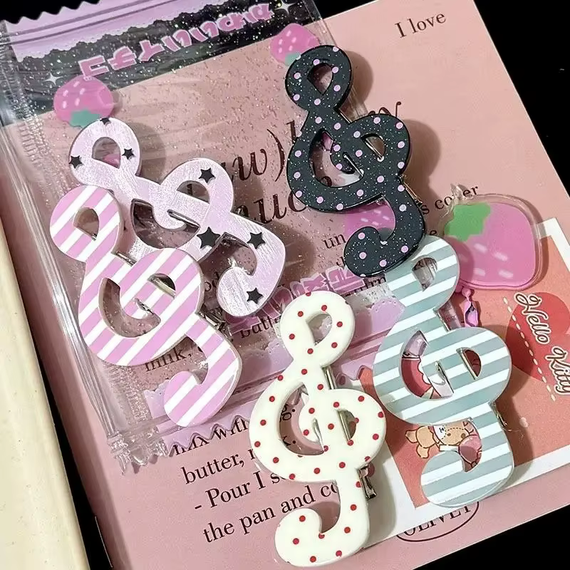 Barrettes à rayures et motifs musicaux pour filles