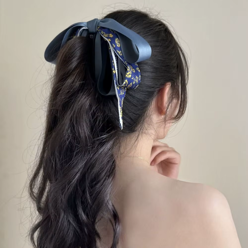 Pince à cheveux élégante en forme de nœud papillon