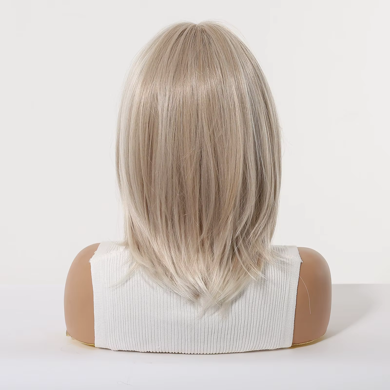 Perruque Bob dégradé blond platine de 12 pouces avec frange