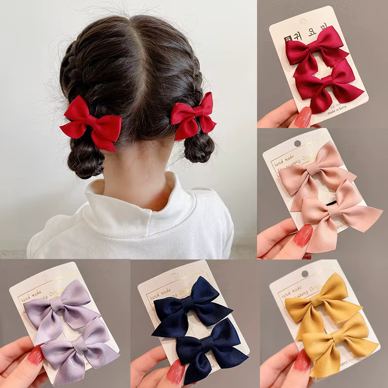 Barrettes à nœud bleu, 2 pièces