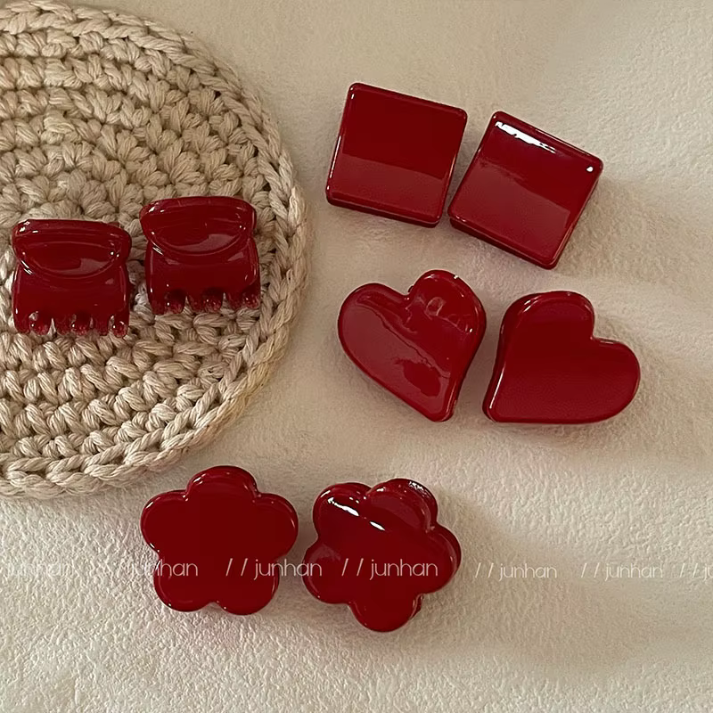 Pince à cheveux rouge