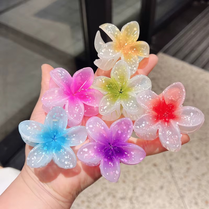 Pince à cheveux transparente à paillettes
