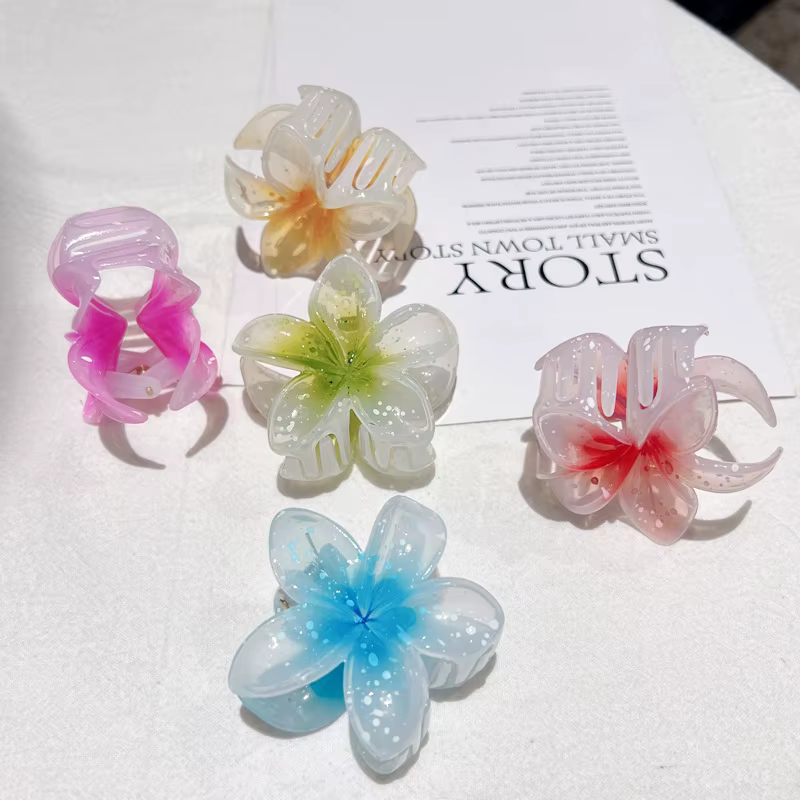Pince à cheveux transparente à paillettes