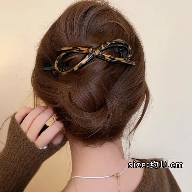 Pinces à cheveux torsadées imprimé léopard pour femmes