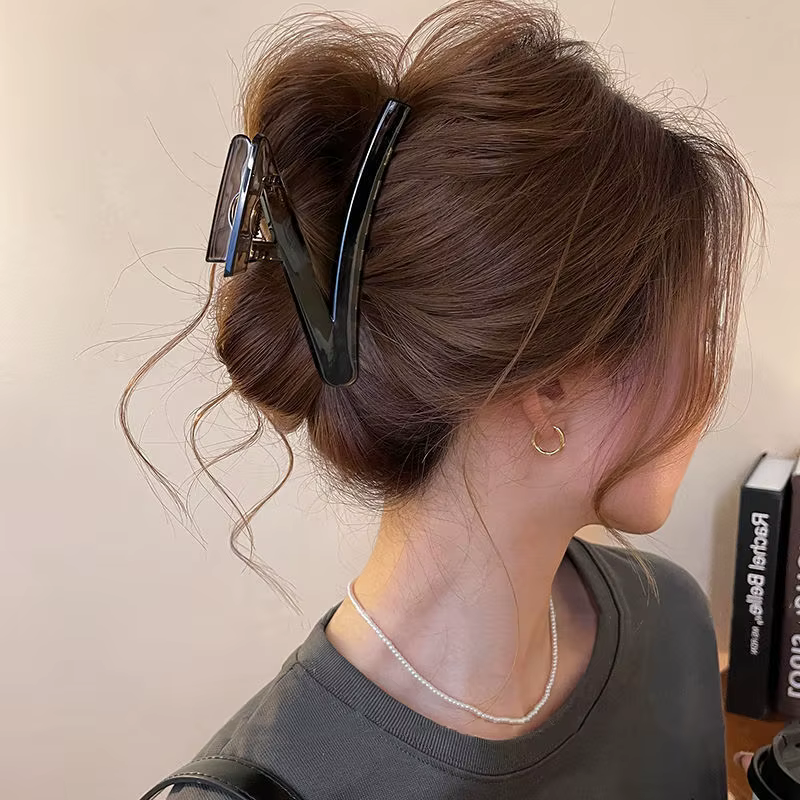 Pince à cheveux avec nœud en plastique