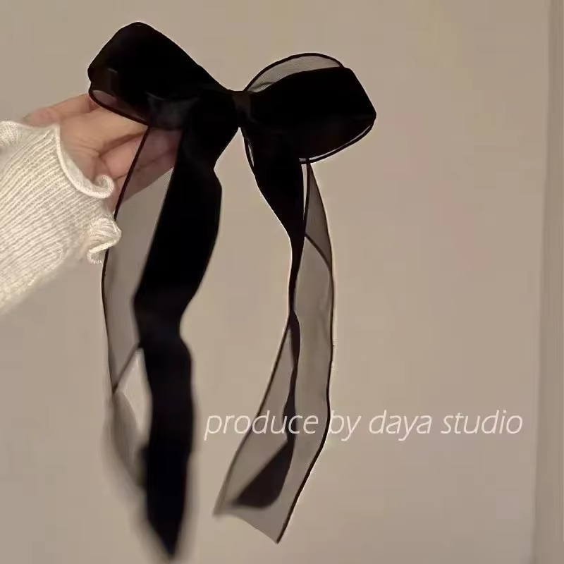 Épingle à cheveux en velours noir avec grand nœud