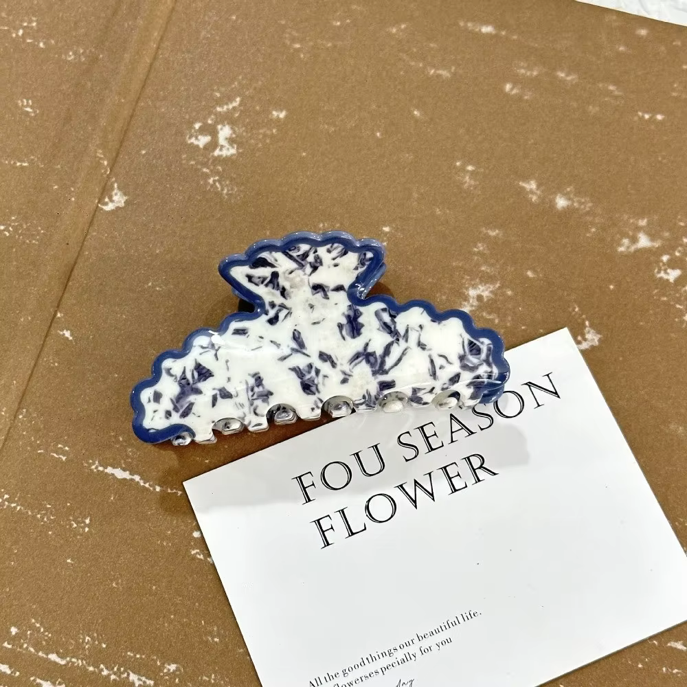 Pinces à cheveux en porcelaine bleue et blanche