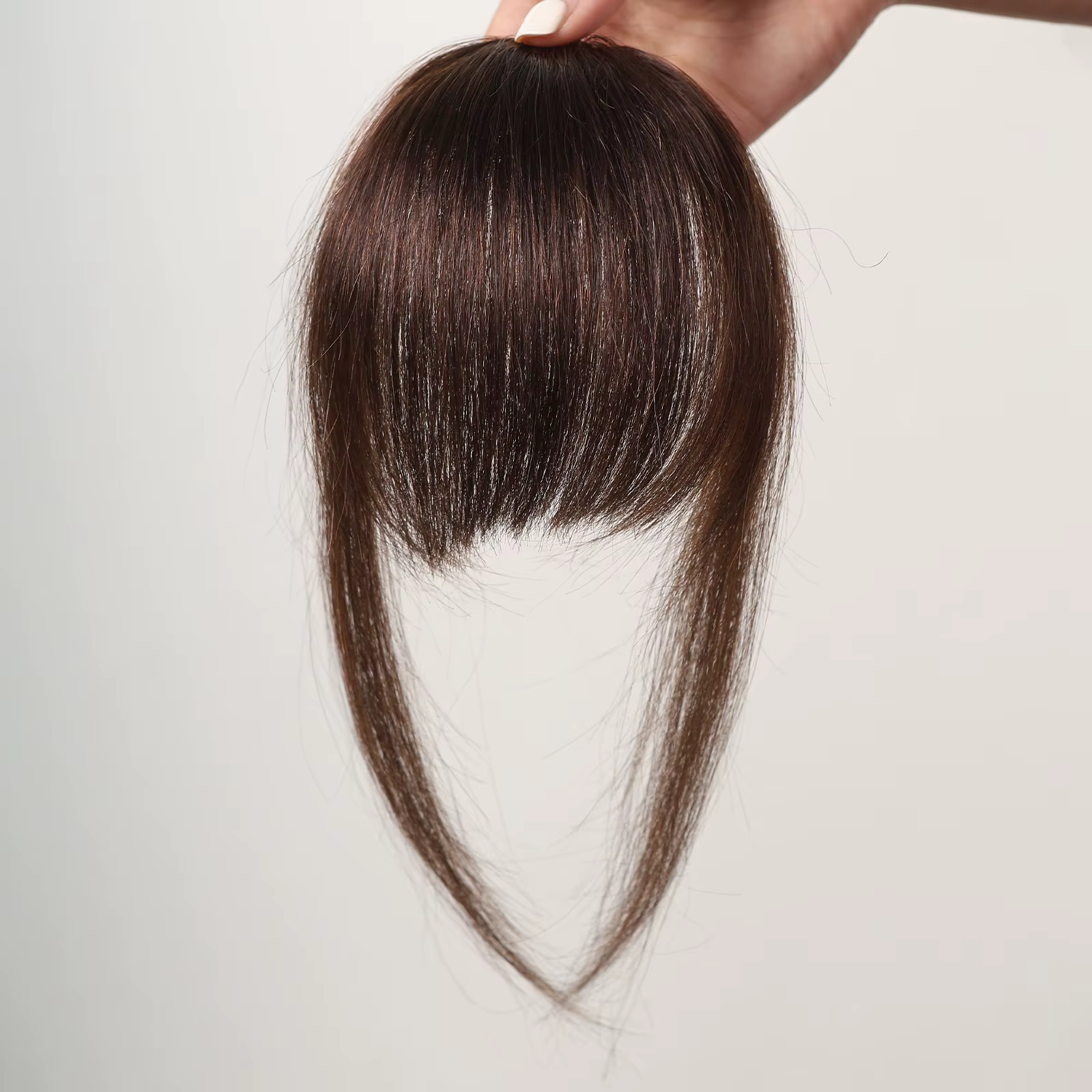 Frange vaporeuse brune