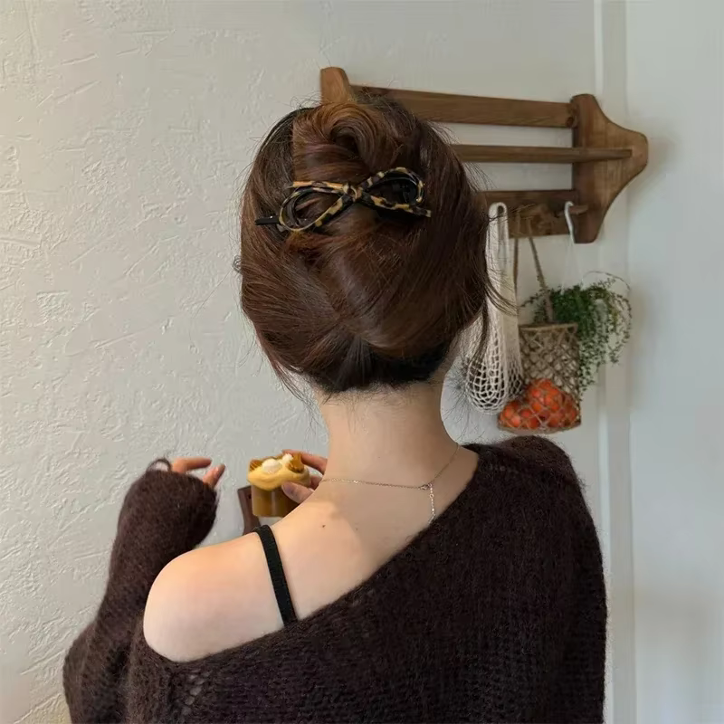 Pinces à cheveux torsadées imprimé léopard pour femmes