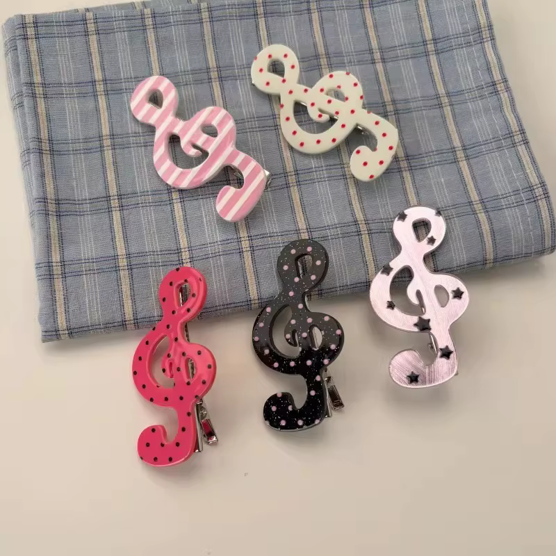 Barrettes à rayures et motifs musicaux pour filles