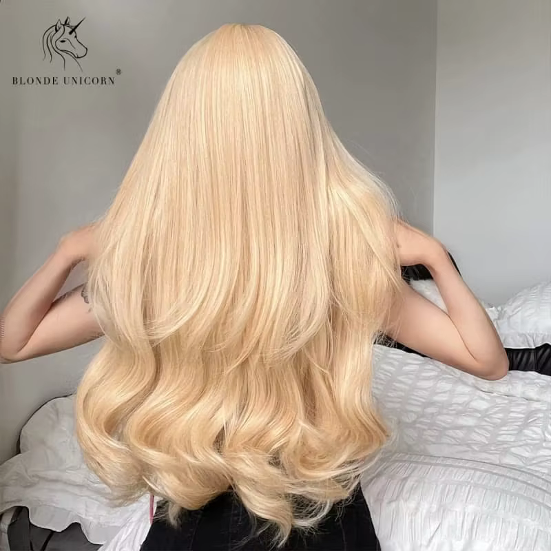 Perruque synthétique longue ondulée licorne Blonde dorée naturelle avec frange