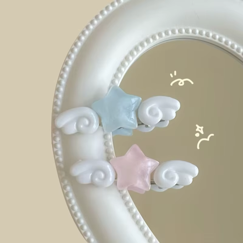 Pince à cheveux en forme d'aile d'étoile