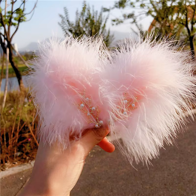 Pince à cheveux pour coiffure en plumes