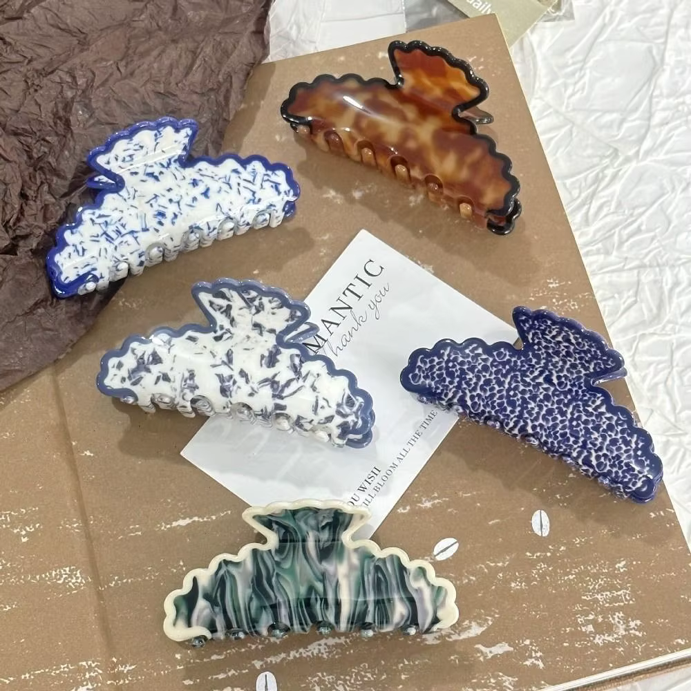 Pinces à cheveux en porcelaine bleue et blanche