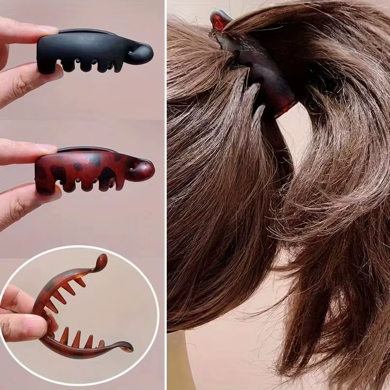 Pince à cheveux ergonomique en forme de banane