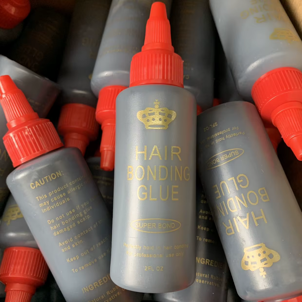 Colle de liaison de trame de cheveux