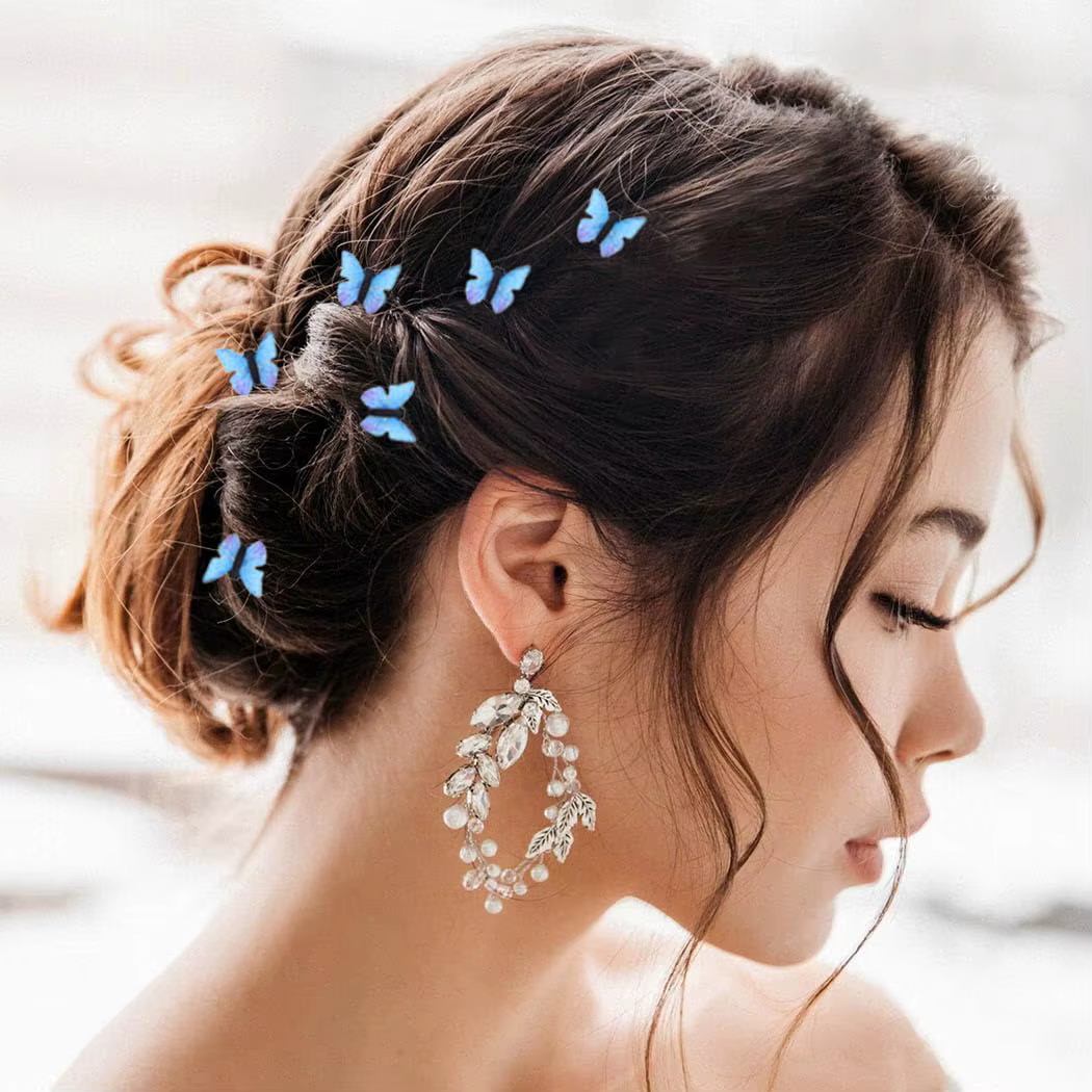 Pinces à cheveux papillon bleues
