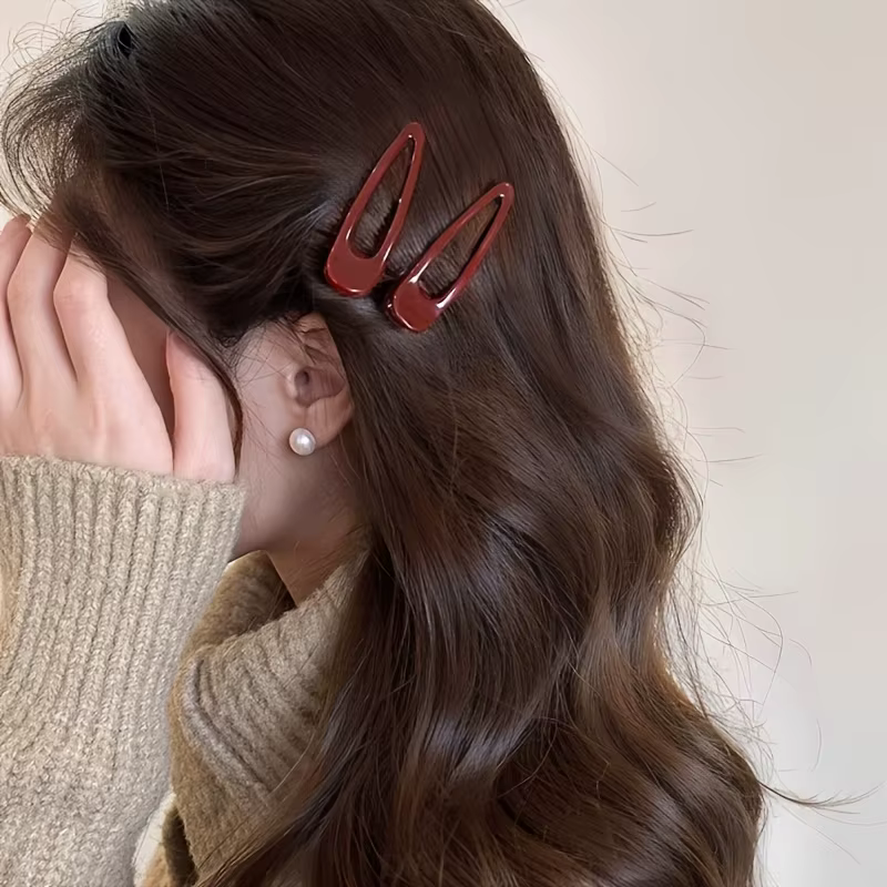 2 pinces à cheveux bordeaux