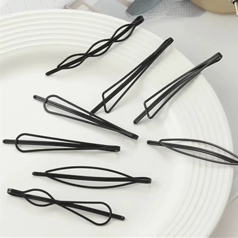 Épingles à cheveux noires ondulées