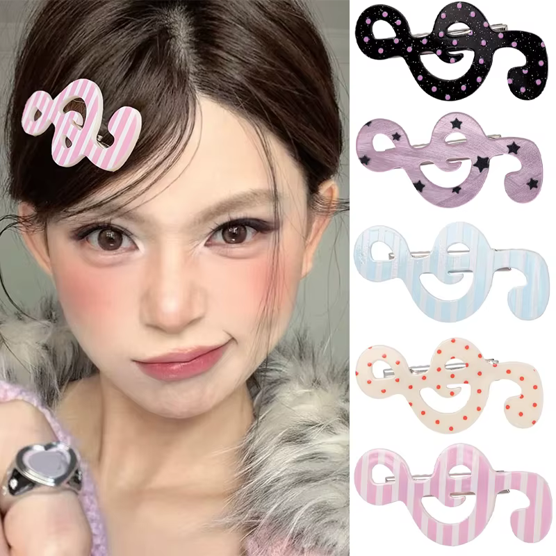 Barrettes à rayures et motifs musicaux pour filles
