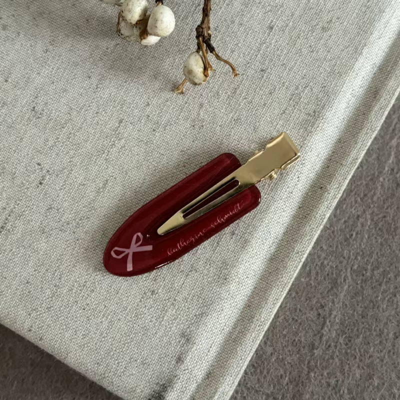 Pince à cheveux à carreaux avec nœud bordeaux