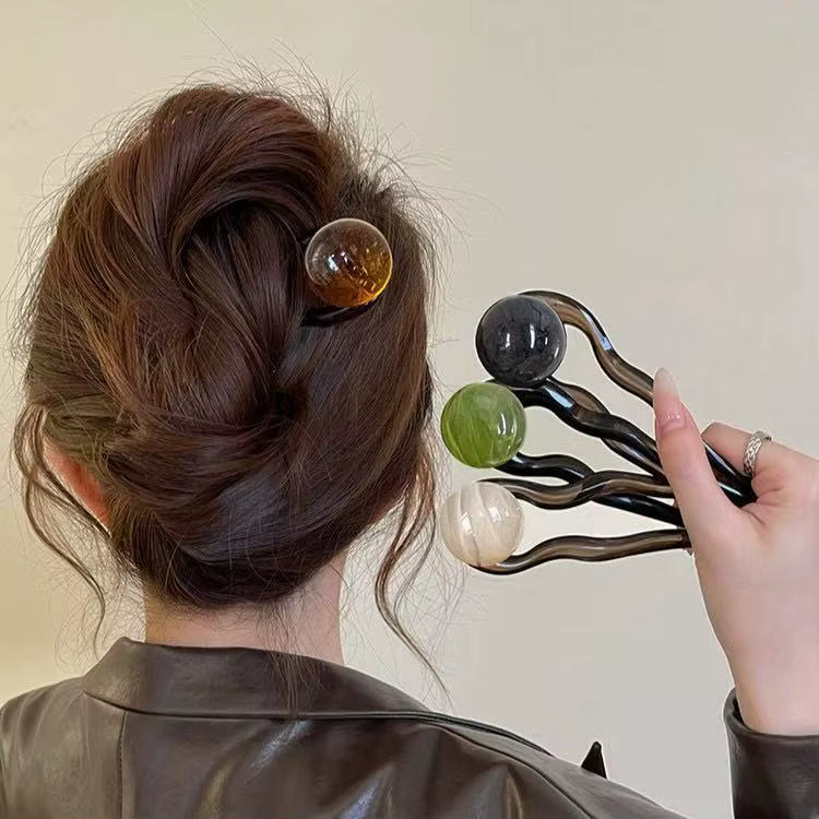 Bâtonnets de cheveux en perles