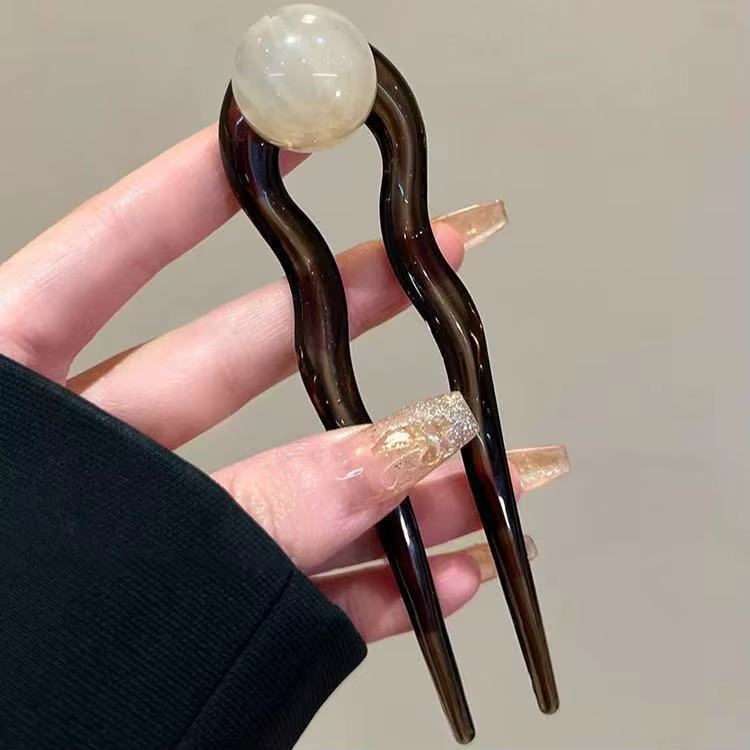 Bâtonnets de cheveux en perles