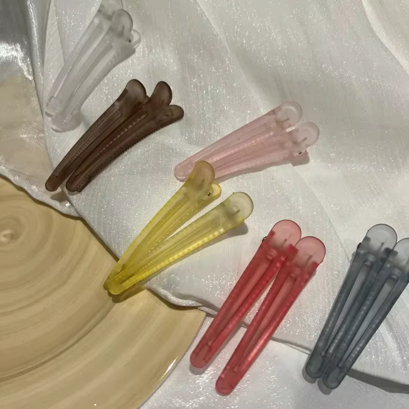 Pinces à cheveux colorées givrées en bec de canard
