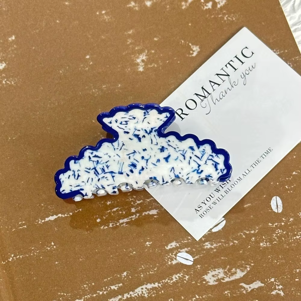Pinces à cheveux en porcelaine bleue et blanche