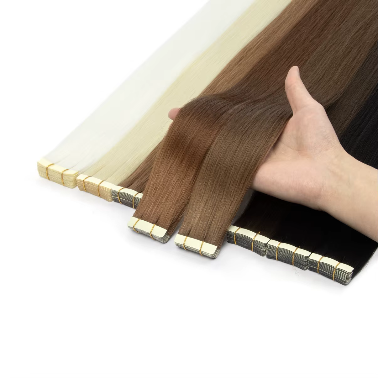 Extensions de cheveux synthétiques à bandes adhésives