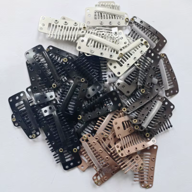 Clips à clipser pour extensions de cheveux humains