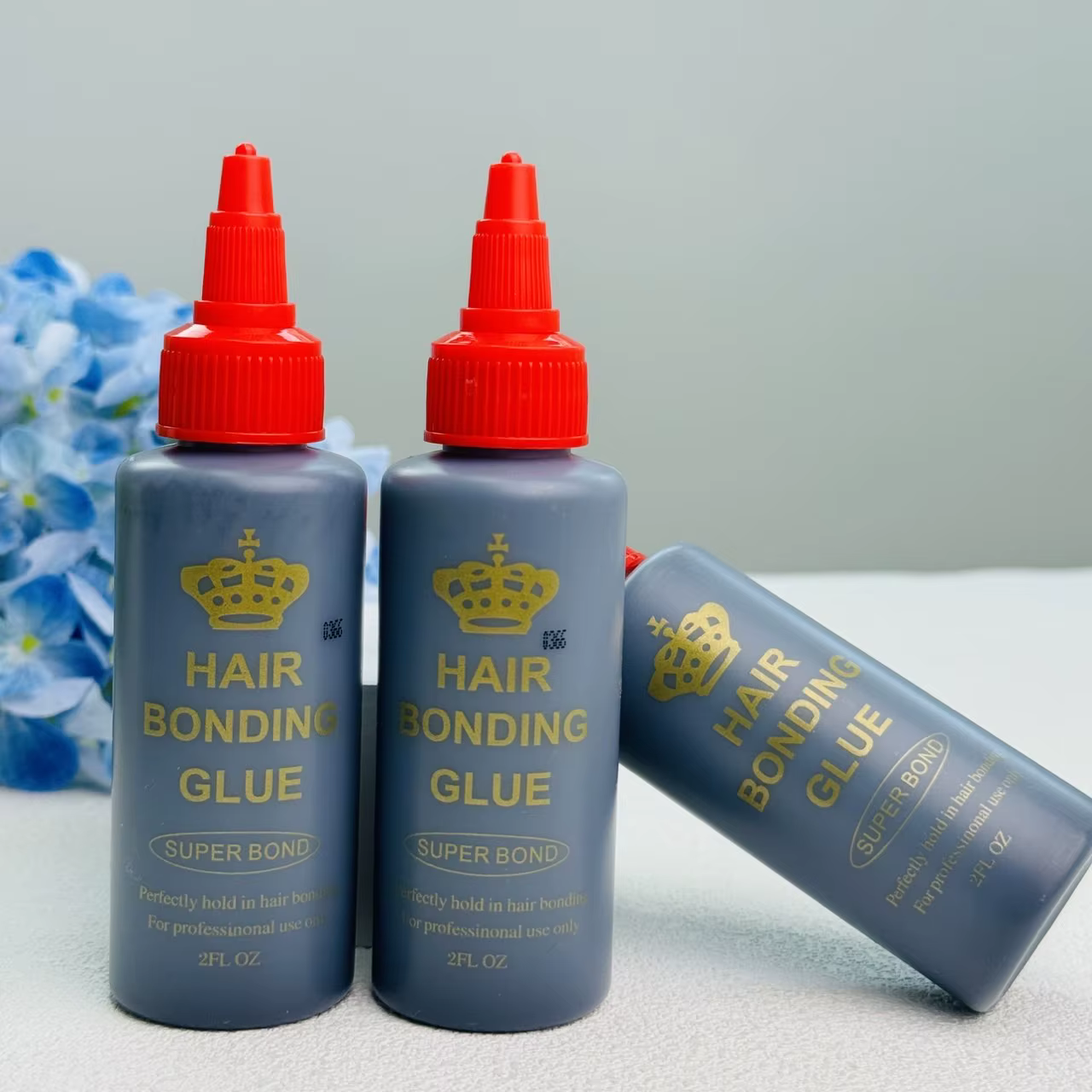 Colle noire pour tissage capillaire