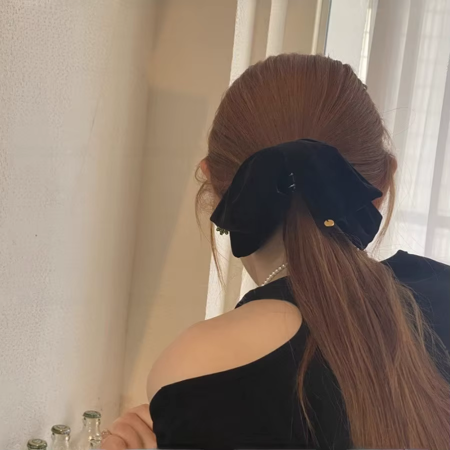 Pince à cheveux élégante en velours avec nœud papillon