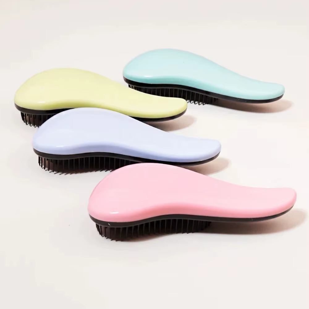 Brosse démêlante antistatique massante