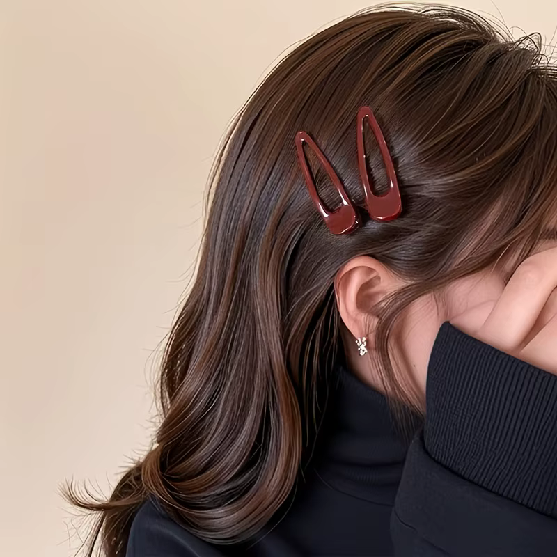 2 pinces à cheveux bordeaux